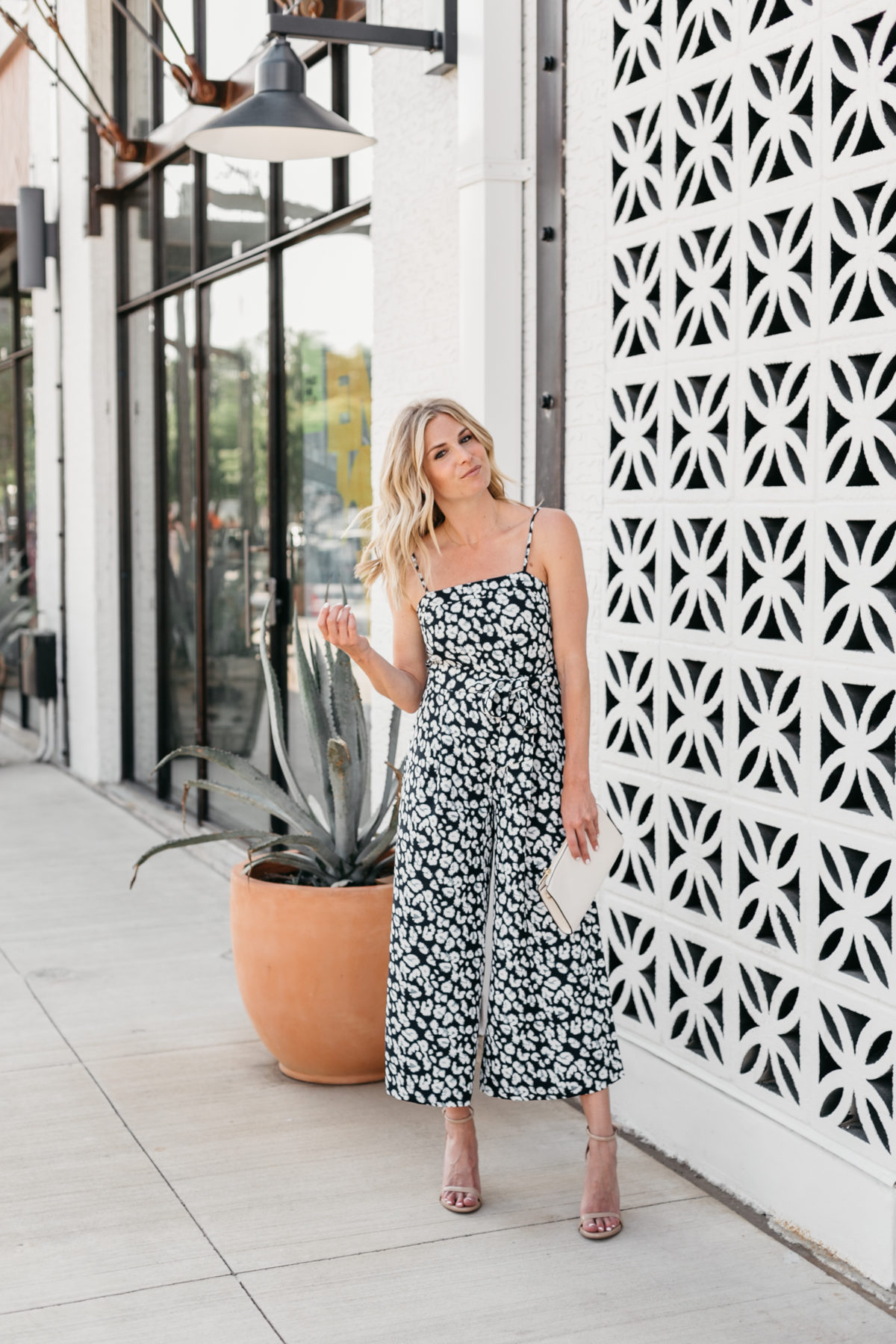 One Small Blonde is wearing a jumpsuit from Banana Republic