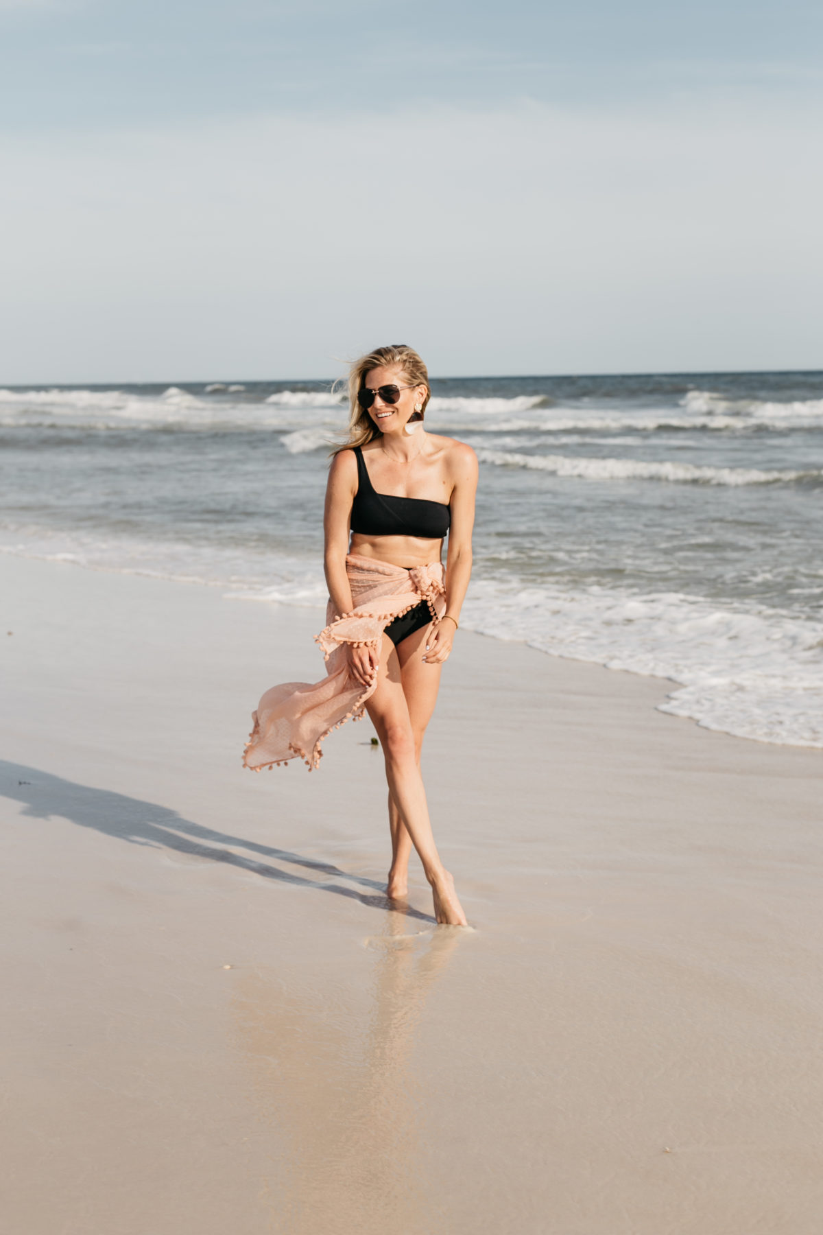 Outfit details: Black Swim Top // Pink Sarong // Sunnies // Pearl Statement Earrings